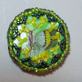  Transfer on mother of pearl with beaded border 