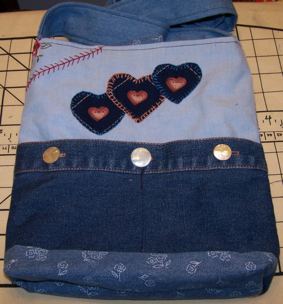 reverse of purse 1, denim and cotton with hand and machine embroidery
