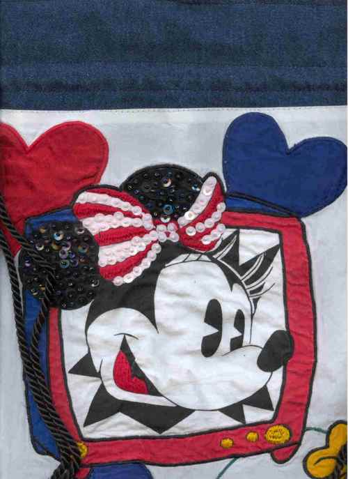 Mickey Mouse embroidery on a denim bag