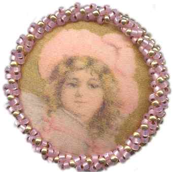 Girls head in pink with hat, beaded 1&1/4