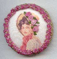 Lady printed on silk with bullion stitch roses and beaded border