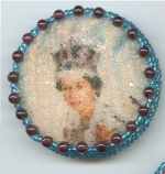 Queen Elizabeth, printed on silk, beaded border, coralene surfact treatment